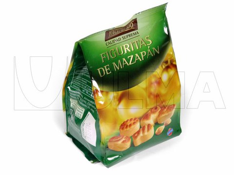 Marzipan packaging in VFFS machine in flat bottom pack with 4 edge seals in BOPP film.