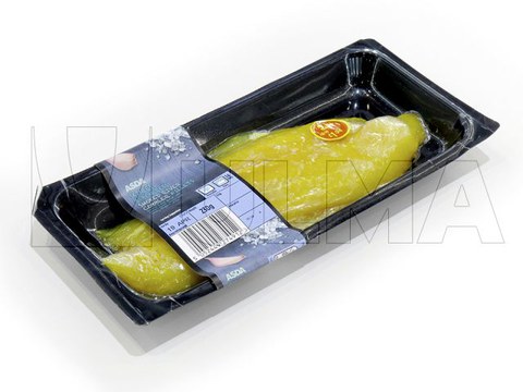 Smoked skiff fillets skin packaging in thermoforming