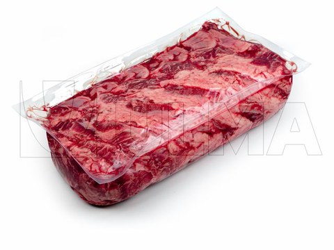 Blocks of fresh meat vacuum packaging in thermoforming in flexible film