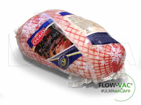 Vacuum packing of ham pieces using a FLOW-VAC system