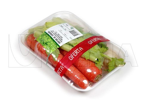 Fresh vegetables tray packaging in stretch film