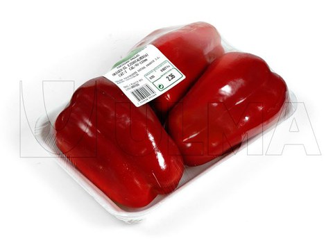 Red peppers tray packaging in stretch film