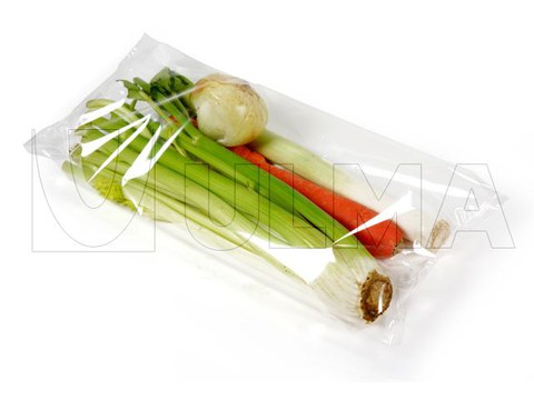 Vegetable packaging (celery, onion, leek and carrot) in flow pack with BOPP film