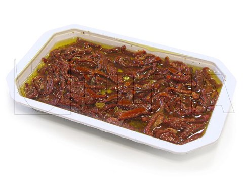Dried tomatoes with anchovies and spices packaging in traysealing in modified atmosphere (MAP) in rigid trays