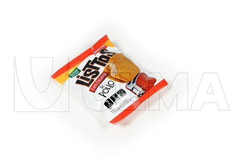 Stacks of crumbled, breadeed frozen meat filet or chicken breast packing