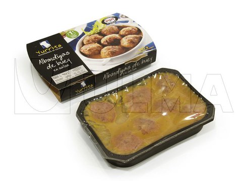 Cooked meatballs with sauce packaging in traysealing in vacuum pack